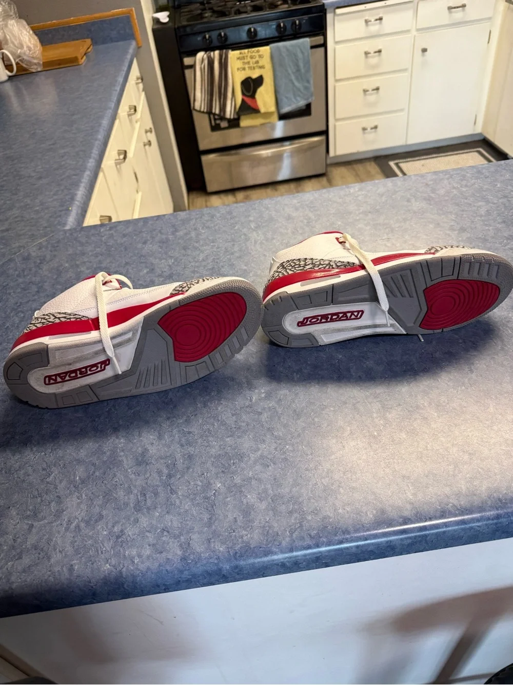 Jordan Men’s White and Red Elephant-Print Sneakers